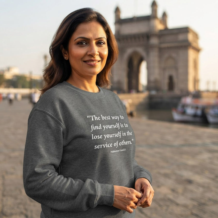 Gray Expressionize sweatshirt printed with the Mahatma Gandhi quote “The best way to find yourself is to lose yourself in the service of others.”