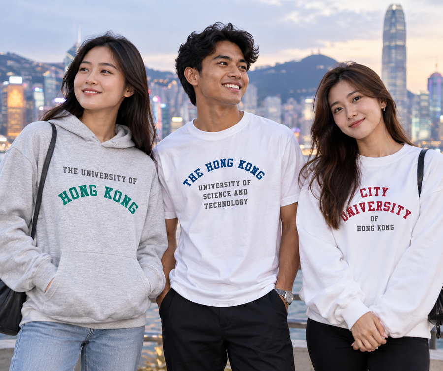 Three friends on the Hong Kong waterfront at sunset wearing custom university apparel: a light grey hoodie, a white tee and a white sweatshirt.