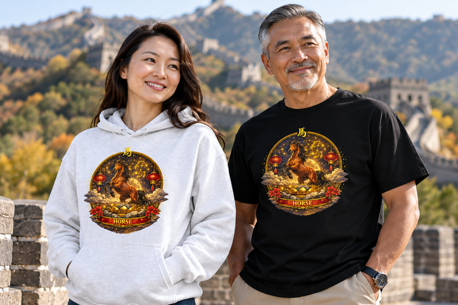 Woman in an ash grey hoodie and man in a black tee, both printed with the Expressionize Year of the Horse design, standing on the Great Wall of China