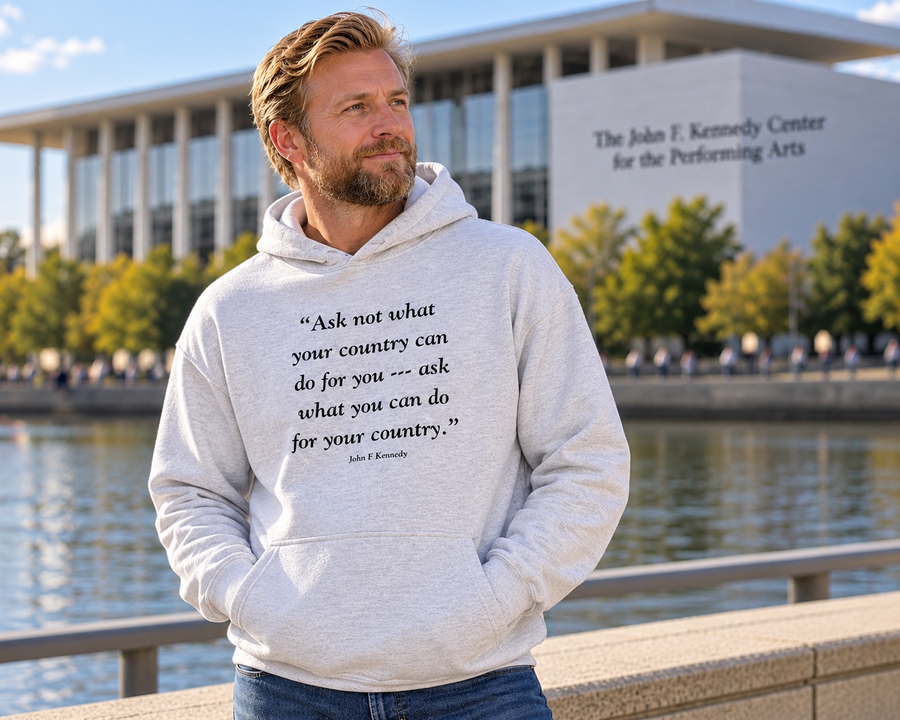 Custom hoodie featuring John F. Kennedy’s “Ask not what your country can do for you” quote, shown outdoors near the Kennedy Center.