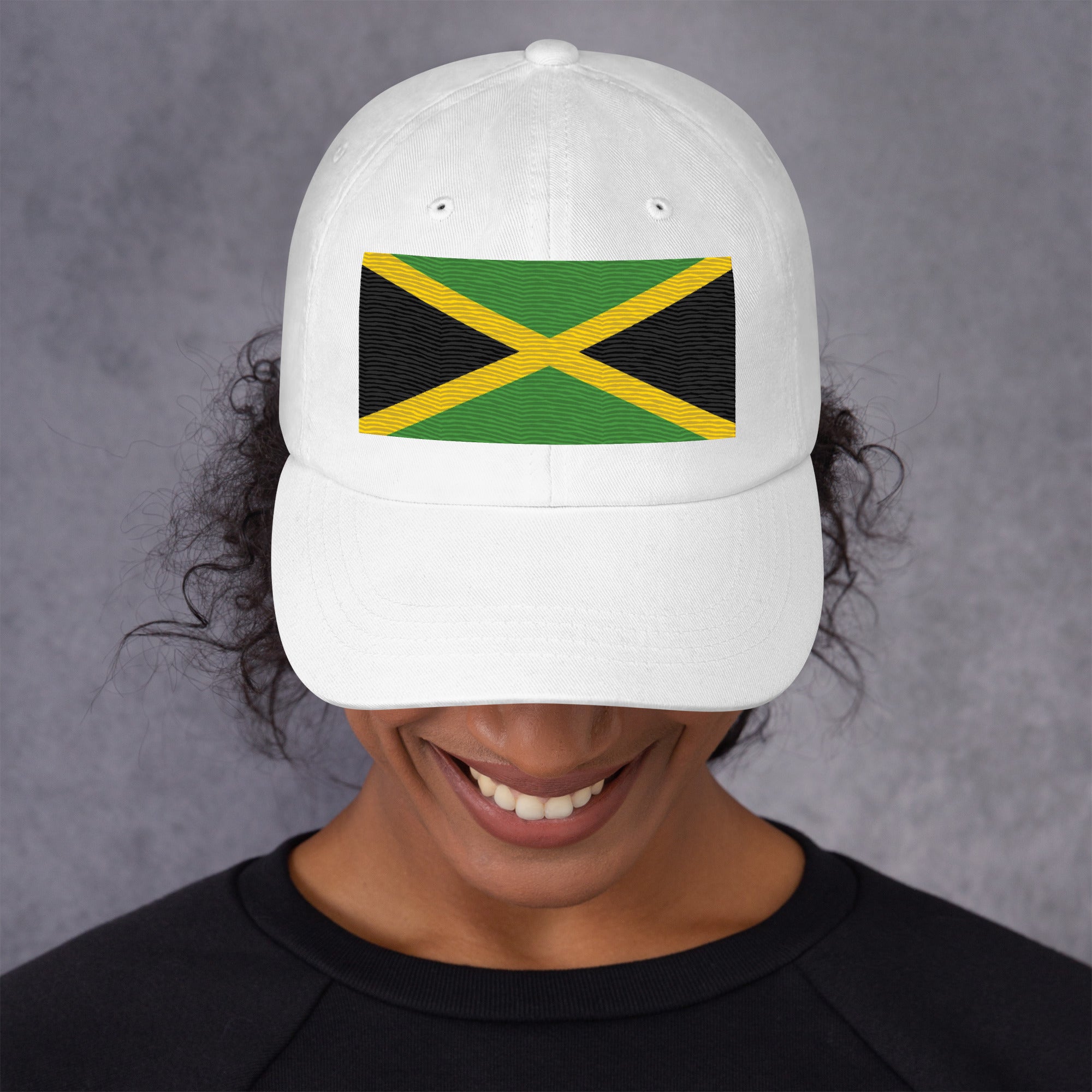 Baseball cap with embroidered Jamaica flag featuring gold diagonal cross on black and green