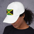 Baseball cap with embroidered Jamaica flag featuring gold diagonal cross on black and green