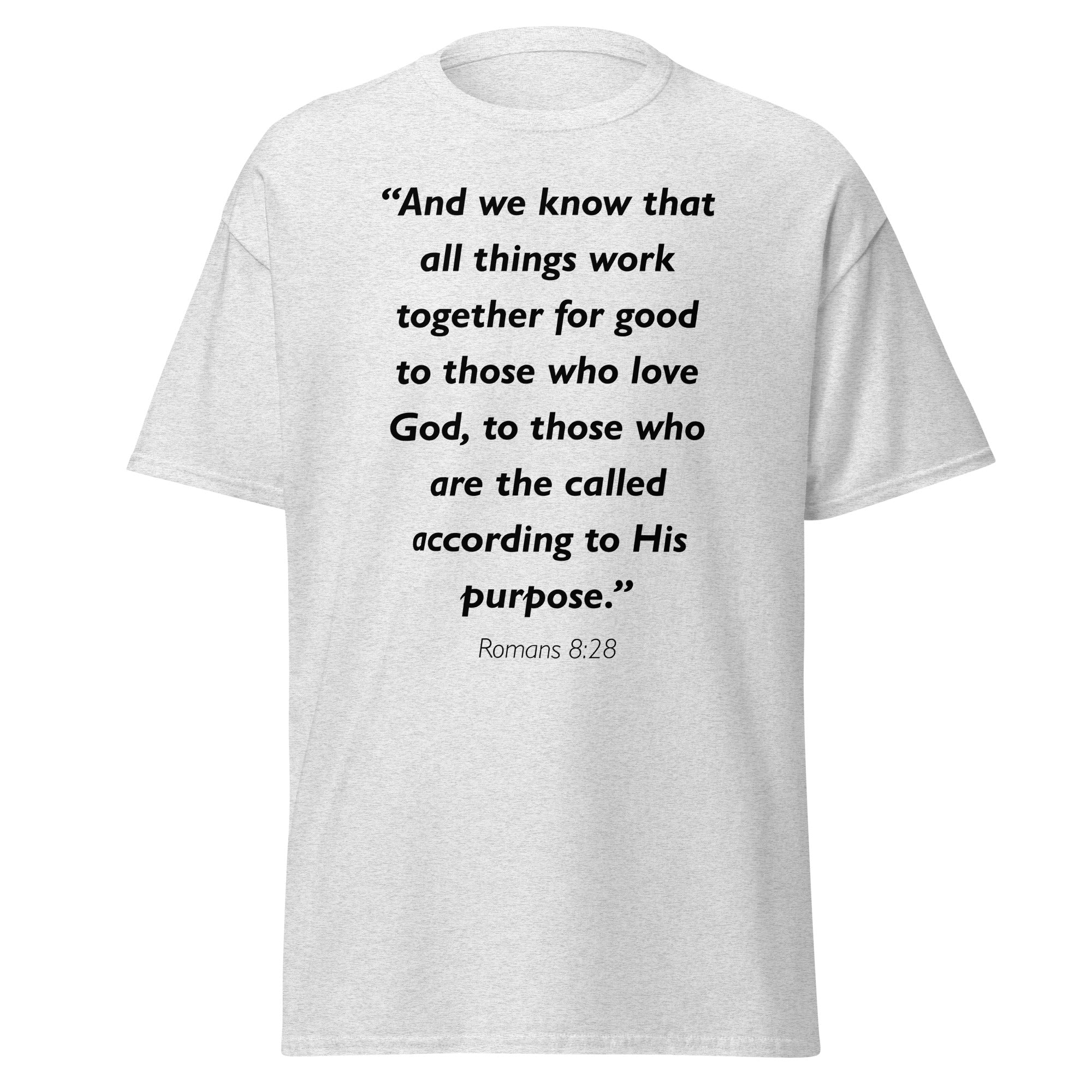 Unisex black t-shirt with Romans 8:28 Bible verse printed in black text on front