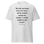 Unisex black t-shirt with Psalm 46:10 Bible verse printed in black text on front