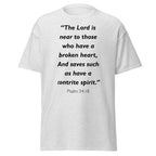 Unisex navy blue t-shirt with Psalm 34:18 Bible verse printed in black text on front
