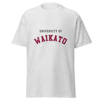 Unisex navy blue t-shirt featuring University of Waikato logo printed across the front chest