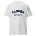 Unisex navy blue t-shirt featuring Auburn University logo printed across the front chest