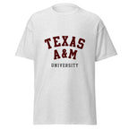 Unisex heather gray t-shirt featuring Texas A&M University logo printed across the front chest