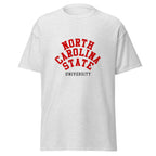 Unisex heather gray t-shirt featuring North Carolina State University logo printed across the front chest