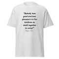 Unisex black t-shirt with Psalm 133:1 Bible verse printed across the chest