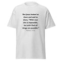 Unisex black t-shirt with Matthew 19:26 Bible verse printed across the chest