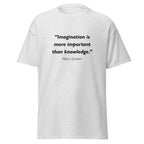 Unisex heather gray t-shirt featuring Albert Einstein Imagination Knowledge quote typography printed across the front chest