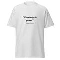 Unisex black t-shirt featuring Francis Bacon Knowledge Power quote typography printed across the front chest