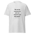 Unisex black t-shirt with Romans 12:21 Bible verse printed across the chest