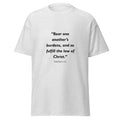 Unisex heather gray t-shirt with Galatians 6:2 Bible verse printed across the chest