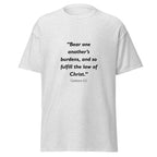 Unisex heather gray t-shirt with Galatians 6:2 Bible verse printed across the chest