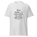 Unisex black t-shirt with 1 Timothy 4:12 Bible verse printed across the chest