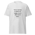 Unisex black t-shirt with 1 John 3:18 Bible verse printed across the chest