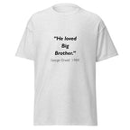 Unisex black t-shirt featuring George Orwell 1984 Big Brother quote typography printed across the front chest