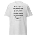 Unisex black t-shirt featuring Nelson Mandela Freedom quote typography printed across the front chest
