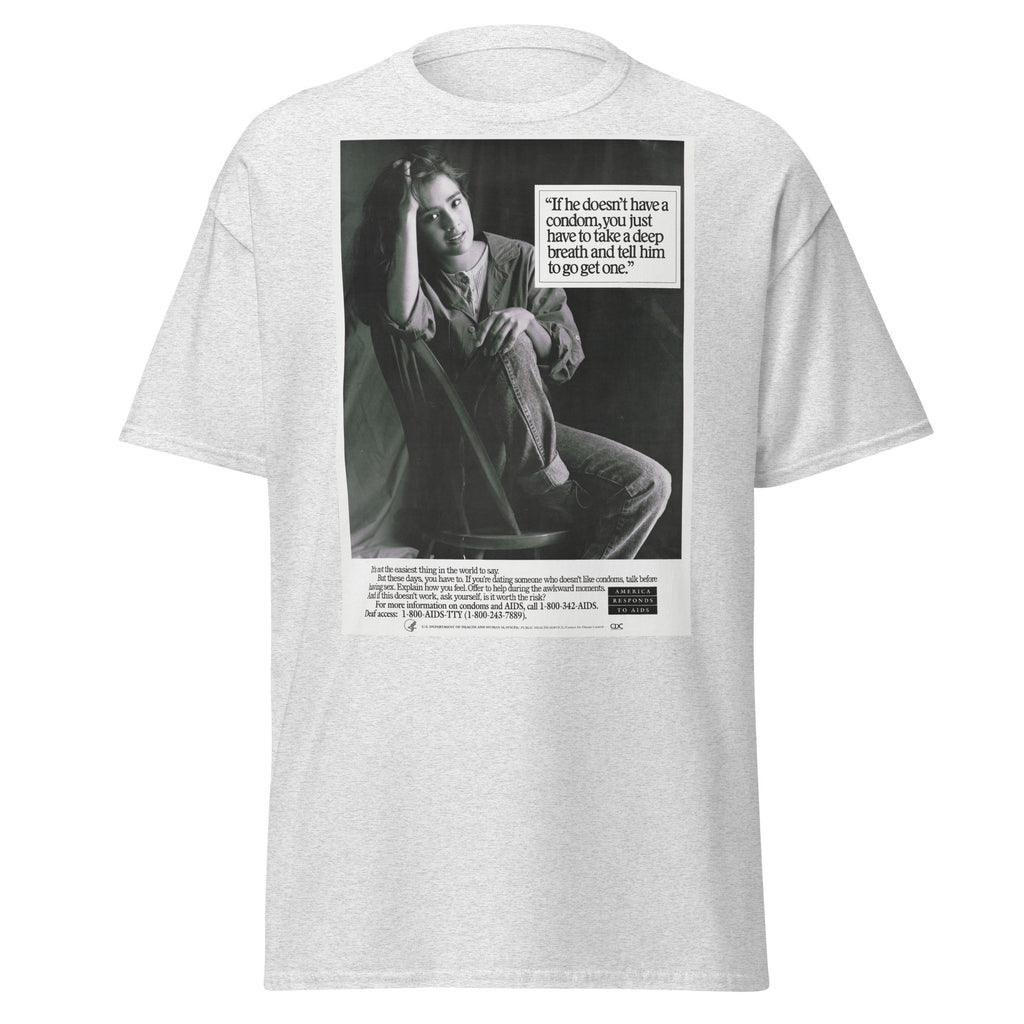 Unisex heather gray t-shirt featuring vintage AIDS Condom poster artwork printed across the front
