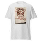 Unisex black t-shirt featuring vintage Wounded Knee Pilgrimage poster artwork printed across the front