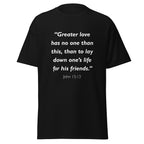 Unisex black t-shirt with John 15:13 Bible verse printed in white text on front