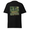 Unisex t-shirt featuring Claude Monet 'Poirier En Fleurs' artwork, shown in Black, front view, sizes S–5XL