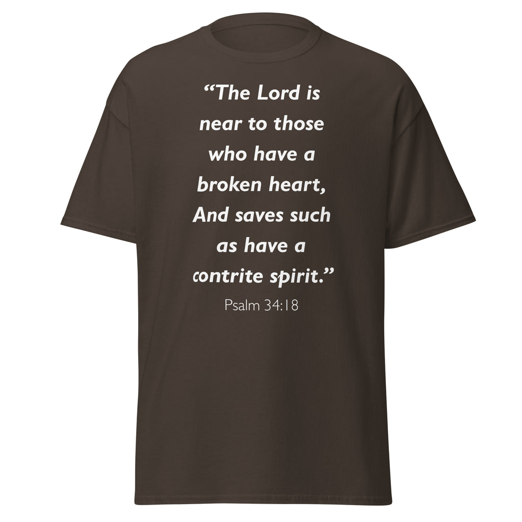 Unisex navy blue t-shirt with Psalm 34:18 Bible verse printed in white text on front