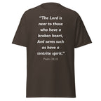 Unisex navy blue t-shirt with Psalm 34:18 Bible verse printed in white text on front