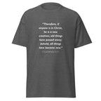 Unisex black t-shirt with 2 Corinthians 5:17 Bible verse printed in white text on front