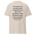Unisex navy blue t-shirt with Ephesians 2:8-9 Bible verse printed in black text on front