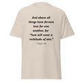 Unisex navy blue t-shirt with 1 Peter 4:8 Bible verse printed in black text on front