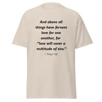 Unisex navy blue t-shirt with 1 Peter 4:8 Bible verse printed in black text on front