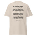 Unisex navy blue t-shirt with Philippians 4:6-7 Bible verse printed in black text on front