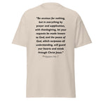 Unisex navy blue t-shirt with Philippians 4:6-7 Bible verse printed in black text on front