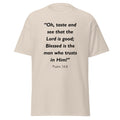 Unisex navy blue t-shirt with Psalm 34:8 Bible verse printed in black text on front