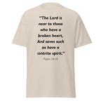 Unisex heather gray t-shirt with Psalm 34:18 Bible verse printed in black text on front