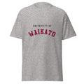 Unisex heather gray t-shirt featuring University of Waikato logo printed across the front chest
