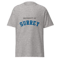 Unisex heather gray t-shirt featuring University of Surrey logo printed across the front chest
