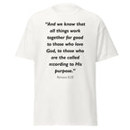Unisex heather gray t-shirt with Romans 8:28 Bible verse printed in black text on front
