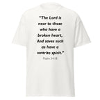 Unisex black t-shirt with Psalm 34:18 Bible verse printed in black text on front