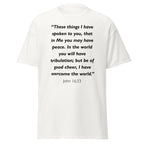 Unisex black t-shirt with John 16:33 Bible verse printed across the chest