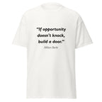Unisex black t-shirt featuring Milton Berle Opportunity quote typography printed across the front chest