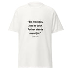 Unisex black t-shirt with Luke 6:36 Bible verse printed across the chest