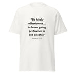 Unisex black t-shirt with Romans 12:10 Bible verse printed across the chest