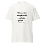 Unisex black t-shirt with Romans 14:19 Bible verse printed across the chest