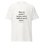 Unisex black t-shirt with Galatians 6:2 Bible verse printed across the chest