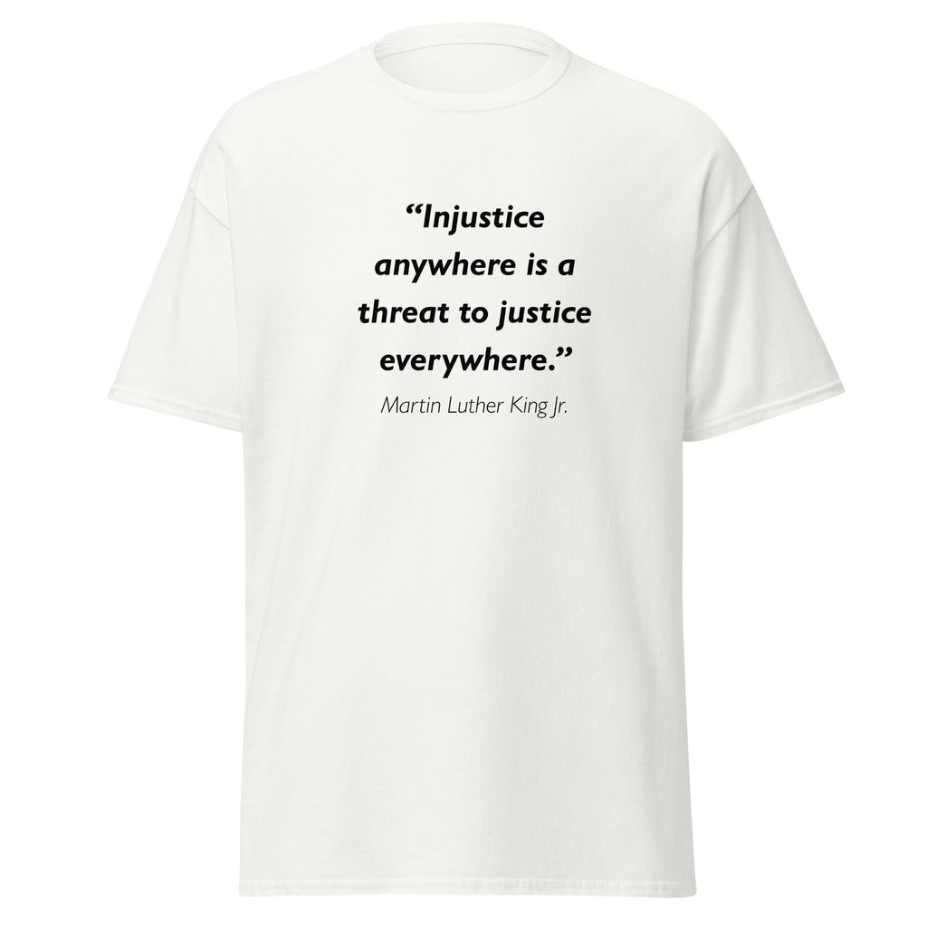 Unisex black t-shirt featuring Martin Luther King Jr Injustice quote typography printed across the front chest