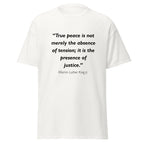 Unisex black t-shirt featuring Martin Luther King MLK True Peace quote typography printed across the front chest
